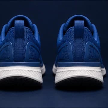 Blue running shoes heel photo
